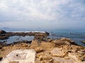 Rocky coast near the ancient Caesarea national park on the Mediterranean coastline, Israel. Royalty Free Stock Photo