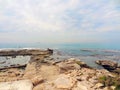 Rocky coast near the ancient Caesarea national park on the Mediterranean coastline, Israel. Royalty Free Stock Photo