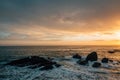 Rocky coast at sunset, at Wood`s Cove, in Laguna Beach, Orange County, California Royalty Free Stock Photo