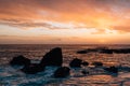 Rocky coast at sunset, at Wood`s Cove, in Laguna Beach, Orange County, California Royalty Free Stock Photo