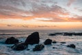 Rocky coast at sunset, at Wood`s Cove, in Laguna Beach, Orange County, California Royalty Free Stock Photo