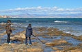 Rocky Coast, Two Boys playing On The Rugged Beach Royalty Free Stock Photo