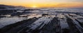 Rocky coast of Zumaia, colorfull sunset over sakoneta beach