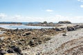 Rocky coastal beach in Inishbofin or White Cow Island with the Atlantic ocean in de background