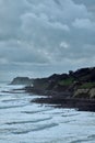 Rocky coastline against a cloudy sky in Ventnor, Isle of Wight, England