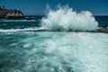 Rocky coastline and big wave breaking on natural swimming pool of Tenerife Island