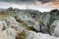 Rocky coastline and lighthouse Royalty Free Stock Photo