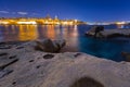 Rocky coastline of Malta and the architecture of Valletta city at night Royalty Free Stock Photo