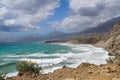 Rocky coastline with yellow flowers Royalty Free Stock Photo