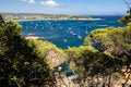 Rocky cove with boats in Costa Brava, Tossa de Mar, Spain