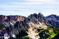 Rocky dolomitic mountains and green valley