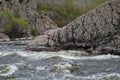 Rocky fast river. Running water, flowing with rapids Royalty Free Stock Photo