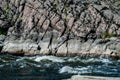 Rocky fast river. Running water, flowing with rapids, horizontal photo. Royalty Free Stock Photo