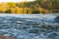 Rocky fast river. Running water, flowing with rapids Royalty Free Stock Photo