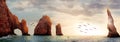 Rocky formations on a sunset background. Famous arches of Los Cabos. Mexico. Baja California Sur. Panoramic image. Royalty Free Stock Photo