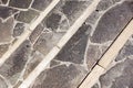 Rocky gray stone stairs perspective pattern texture.