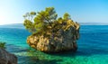 Rocky island in a beautiful blue sea, landscape Royalty Free Stock Photo