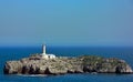 Rocky Island with lighttower near Santander - Spain