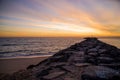 Rocky Jetty and Ocean at Sunrise Royalty Free Stock Photo