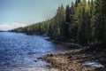 Rocky lakeside in Swedish Lapland with some snow and ice remnants in spring Royalty Free Stock Photo