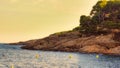 A rocky landscape against the Mediterranean Sea during golden hour Royalty Free Stock Photo