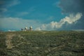 Rocky landscape with bushes and domes of an old radar station Royalty Free Stock Photo