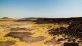 Rocky landscape at Sahara desert near Tchirozerine region, Agadez, Niger Royalty Free Stock Photo