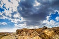 The rocky landscape under the sky with clouds Royalty Free Stock Photo