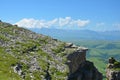 The rocky ledge on a background of mountain Royalty Free Stock Photo