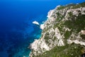 Rocky mountain coast bay aerial view. Beautiful landscape. Blue clear ocean sea water next to cliff in Corfu Greece. Travel and ad Royalty Free Stock Photo