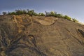 Rocky mountain with cracks and fissures in sunny weather at Lahic Big Caucasus Mountains of Azerbaijan Royalty Free Stock Photo