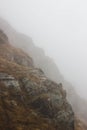Rocky mountain in the fog