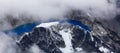 Rocky Mountain Peak and Glacier Lake. Aerial Landscape Nature Background. Royalty Free Stock Photo