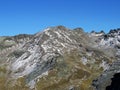 Rocky mountain peak Piz Arpschella (3031 m) in the massif of the Albula Alps above the Swiss road pass Fluela