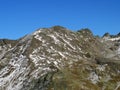 Rocky mountain peak Piz Arpschella (3031 m) in the massif of the Albula Alps above the Swiss road pass Fluela