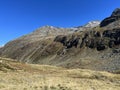 Rocky mountain peak Piz Murterchoembel (2998 m) in the massif of the Albula Alps above the Swiss road pass Fluela Royalty Free Stock Photo