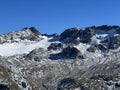 Rocky mountain peaks Piz Sarsura (3176 m) and Grippa Naira (3130 m) in the Albula Alps -Switzerland Royalty Free Stock Photo