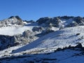 Rocky mountain peaks Piz Sarsura (3176 m) and Grippa Naira (3130 m) in the Albula Alps -Switzerland Royalty Free Stock Photo