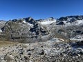 Rocky mountain peaks Piz Sarsura Pitschen (3132 m), Piz Sarsura (3176 m) and Grippa Naira (3130 m) Royalty Free Stock Photo