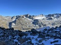 Rocky mountain peaks Piz Sarsura Pitschen (3132 m), Piz Sarsura (3176 m) and Grippa Naira (3130 m) Royalty Free Stock Photo