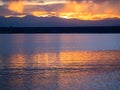 Rocky Mountain Sunset and Rippled Lake Royalty Free Stock Photo