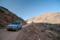 Mitsubishi Pajero Montero on a Gravel road in Wadi bani Awf canyon, Sultanate of Oman