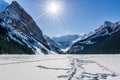 rocky mountains around frozen lake louise winter wonderland