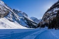rocky mountains around frozen lake louise winter wonderland
