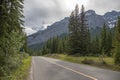 Rocky Mountains. asphalt mountain road on a sunny day. Road with yellow markings. Empty highway in Journey Royalty Free Stock Photo