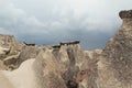 Rocky mountains in Cappadocia, Turkey. Amazing stormy sky Royalty Free Stock Photo