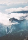 Rocky Mountains peak cliff and clouds foggy Landscape