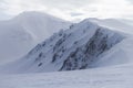 Rocky mountains and snow cornices, winter freeride extreme