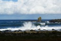 Rocky ocean coast in Northern Ireland. Ocean waves splash Royalty Free Stock Photo