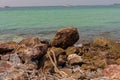 A rocky part of the beach in Koh Larn